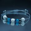 Bracelet en pierres naturelles avec Apatite, Howlite et Pierre de Lune, monté sur fil élastique. Allie équilibre corporel et harmonie émotionnelle dans un design élégant.