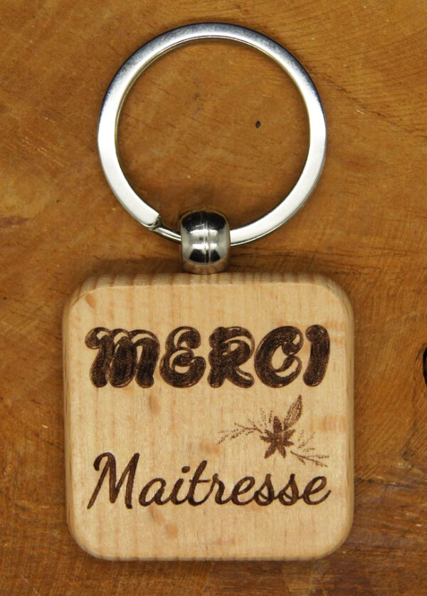 Porte-clés rectangle avec bords arrondis en bois gravé Merci Maitresse avec une fleur, cadeau personnalisé.